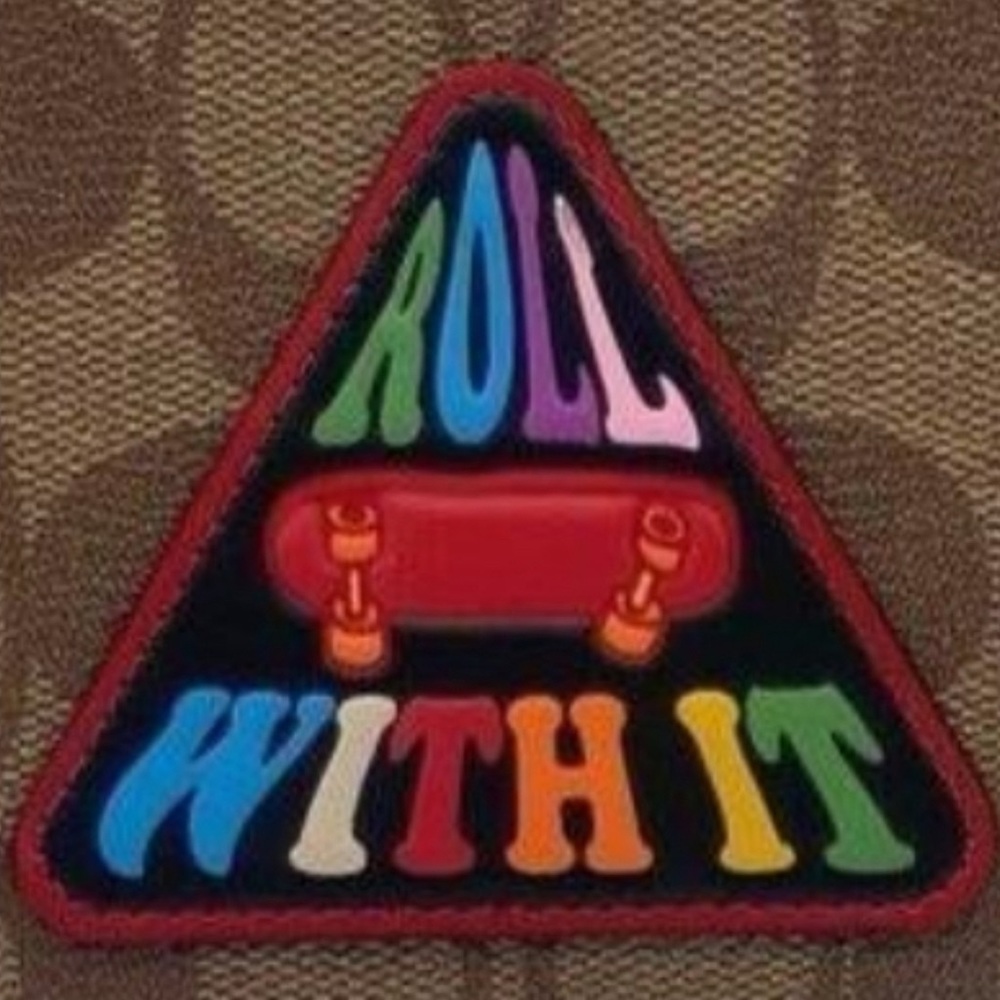NWT Coach “Roll With It” Wristlet - Picture 2 of 7